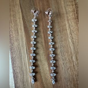 CZ and rose gold tone dangle earrings
